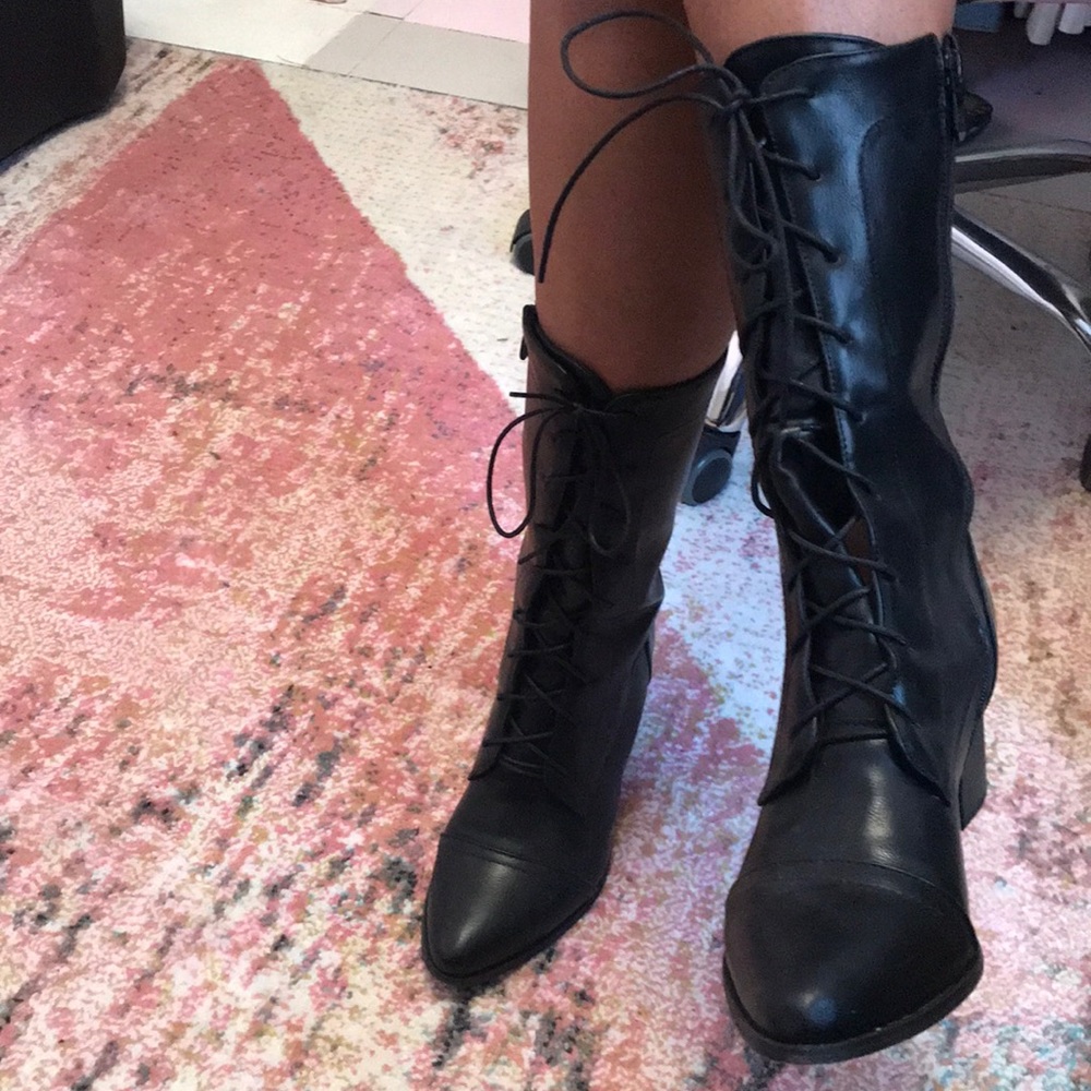 Lace up boots.